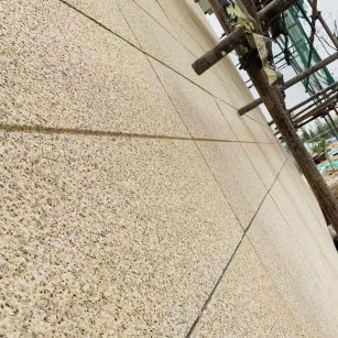 襄阳 黄金麻花岗岩荔枝面外墙干挂石材效果示例