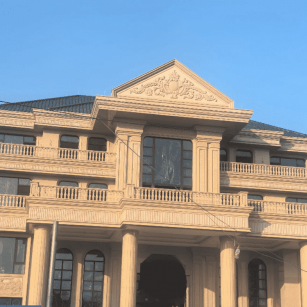 襄阳黄金麻别墅外墙干挂石材效果示例