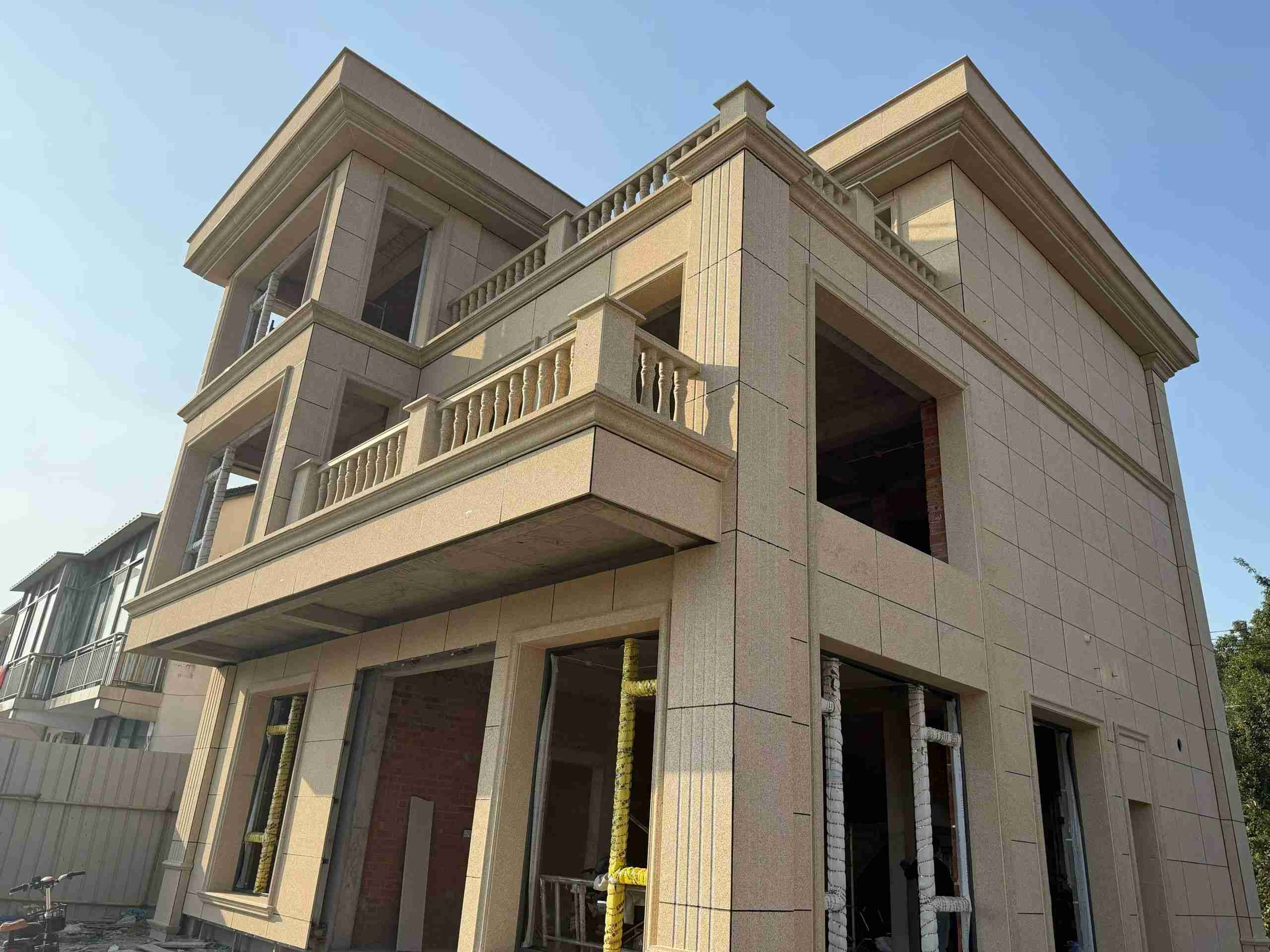 襄阳 黄金麻花岗岩石材荔枝面外墙干挂效果展示